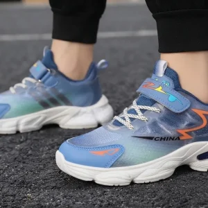 Kids blue sports running sneakers with breathable mesh upper, hook-and-loop strap, air cushion sole, and anti-slip rubber outsole for everyday active wear.