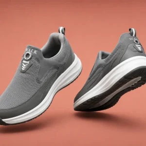 Men's grey slip-on walking shoes with breathable mesh upper, lightweight cushioned sole, and anti-slip outsole for everyday walking, travel, gym, office, and casual wear.